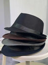 Versatile gray hat that complements any winter attire.