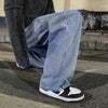 Durable black wide-leg jeans offering all-day comfort and unrestricted movement
