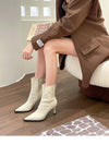 Chic women's ankle boots with zipper, high heel, pointed toe, PU leather, perfect for autumn and winter fashion.