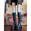 Chic black platform knee-high fashion boots with wedge heel, waterproof design, and bling accents for stylish women.