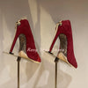 Close-up of the slip-on style of the crystal-embellished pumps.