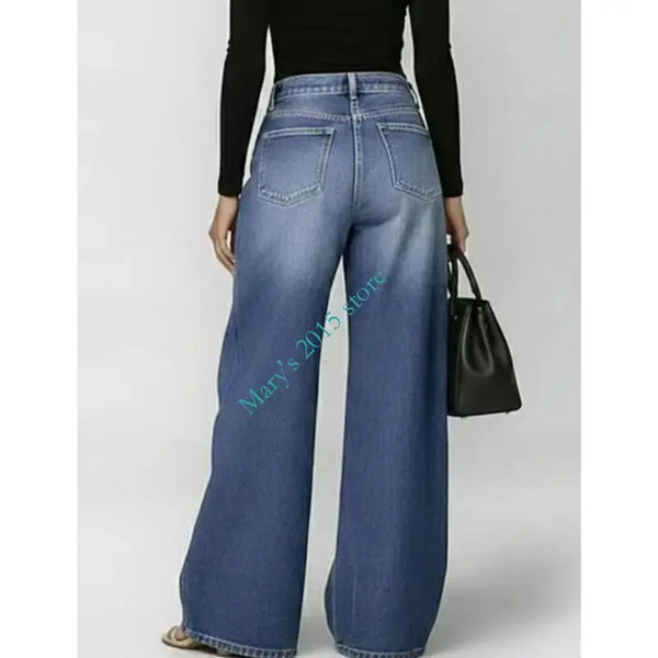 High waisted wide leg jeans with retro finish and bold metal grommet details