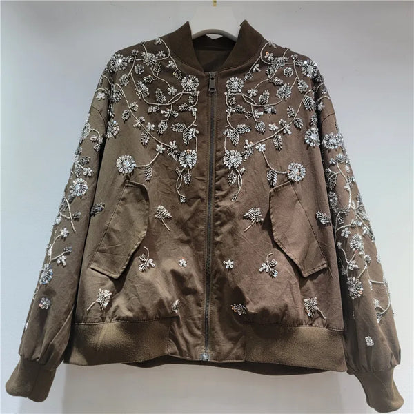 Sleeve detail showing embroidered sequin pattern and regular-fit construction