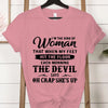 Bold statement tee celebrating female empowerment styled with skirt for chic casual look