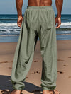 Flowy khaki linen trousers with drawstring waist and comfortable wide leg cut