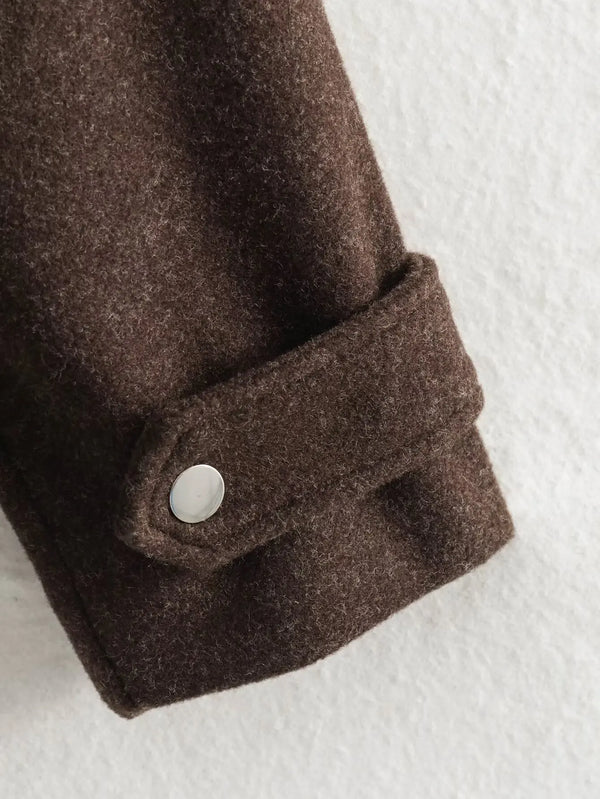Women's autumn outerwear with zip-front closure and defining waist belt