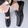 Stylish slip-on loafers in navy leather, perfect for casual outings.