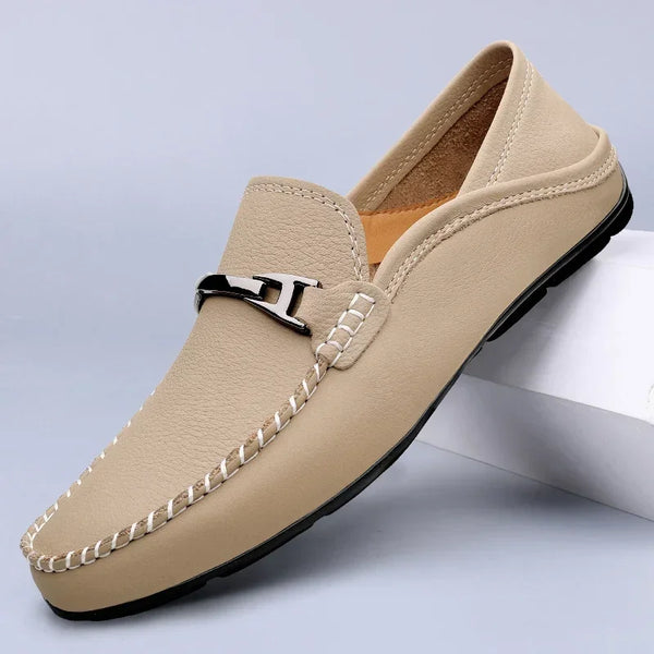 Comfortable and breathable loafers in navy leather for everyday wear.