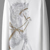 Elegant men's long sleeve printed shirt with vibrant print, turn-down collar, and covered button closure for stylish comfort.