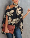 Elegant floral print blouse with batwing sleeves, halter collar, perfect for casual or office wear, made from soft cotton ble