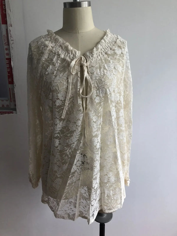 Elegant Boho Lace V-Neck Blouse for women, featuring delicate lace, relaxed fit, and lightweight fabric for spring and summer
