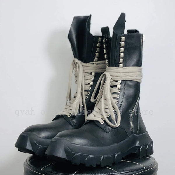 Close-up of genuine full-grain leather on luxury high-top sneakers.