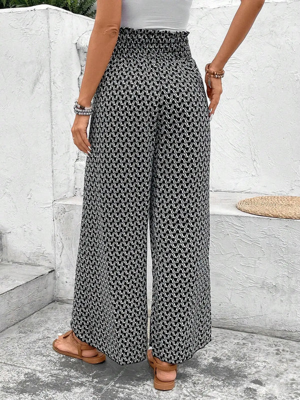 Floral wide-leg chiffon pants for women, ankle-length, elastic waist, perfect for summer fashion and casual chic outfits.