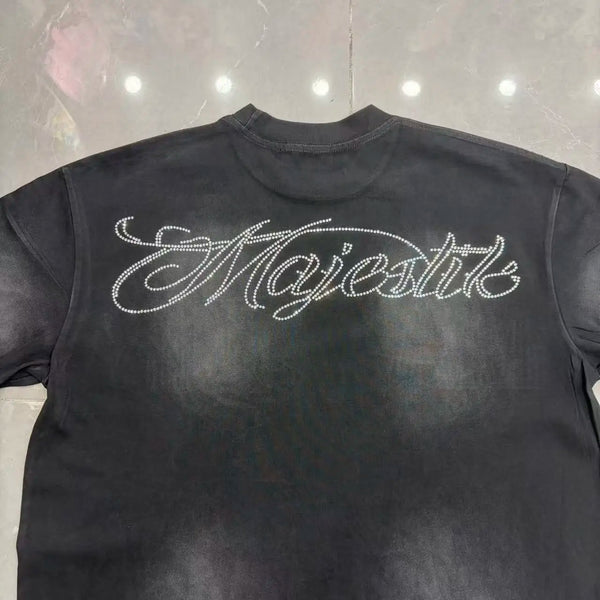 Breathable sleeveless cotton tee featuring dimensional rhinestone detail