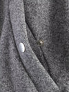 Belted jacket with loose-fit silhouette and elegant turtleneck design