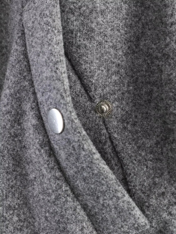 Belted jacket with loose-fit silhouette and elegant turtleneck design