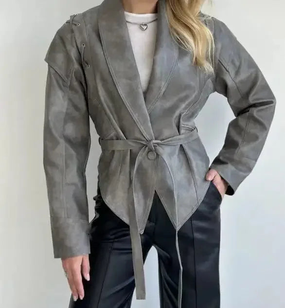 Chic belted leather bomber jacket for women, featuring lace-up detail, notched lapel, and hood for stylish autumn wear.