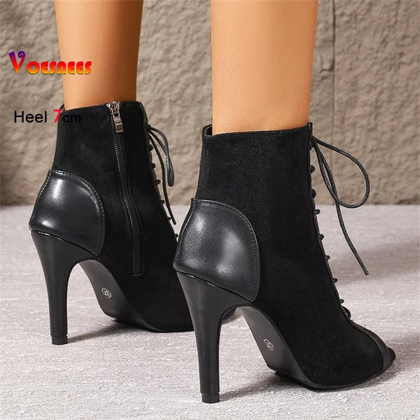 Voesnees dance boots with dramatic lacing and side zip closure for quick costume changes