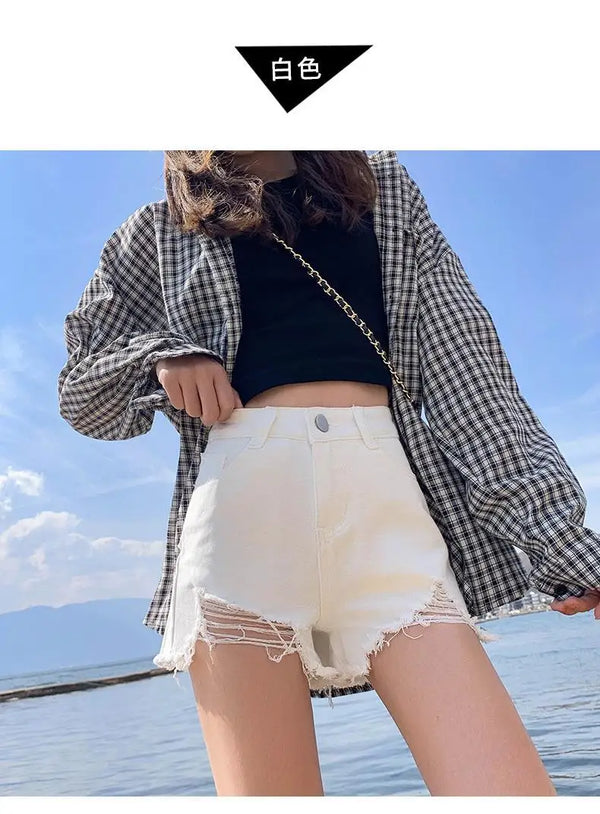 High waisted ripped shorts with hand-finished distressing and real pockets