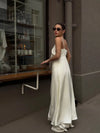 White satin set showing turn-down collar and polished tailoring details