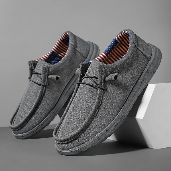 Casual men's footwear featuring breathable construction and lightweight feel