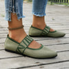 Side view of pointed toe knitted flats with elastic band and cushioned latex insole
