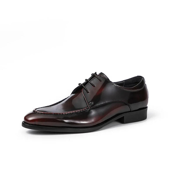 Back view of durable black leather Oxfords with robust rubber outsole.