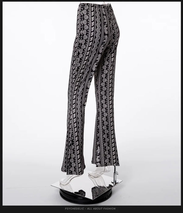 Bohemian flare leg pants for women in vibrant floral print, perfect for spring/summer casual or festival wear.