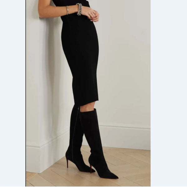 Brown knee-high stiletto boots, ideal for night outs.