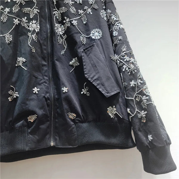 Full front view of stand-up collar jacket with all-over sequin embroidery