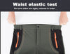 Insulated waterproof pants with fleece lining for winter hiking trails