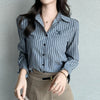 Chic striped blouse for office elegance, featuring a turn-down collar and single-breasted closure, perfect for professional w