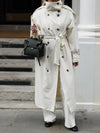 Elegant cream polyester trench coat with double-breasted design for fall and winter