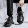Comfortable and breathable black patent leather dress shoes.