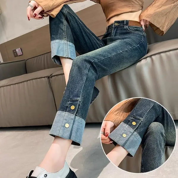 Chic high waist straight leg jeans for women in distressed wash, perfect for casual outings and office wear.