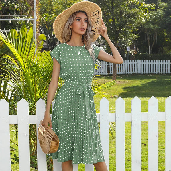 Classic polka dot print on flowing pleated midi dress