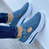 Women's casual white sneakers featuring breathable mesh and low-profile platform