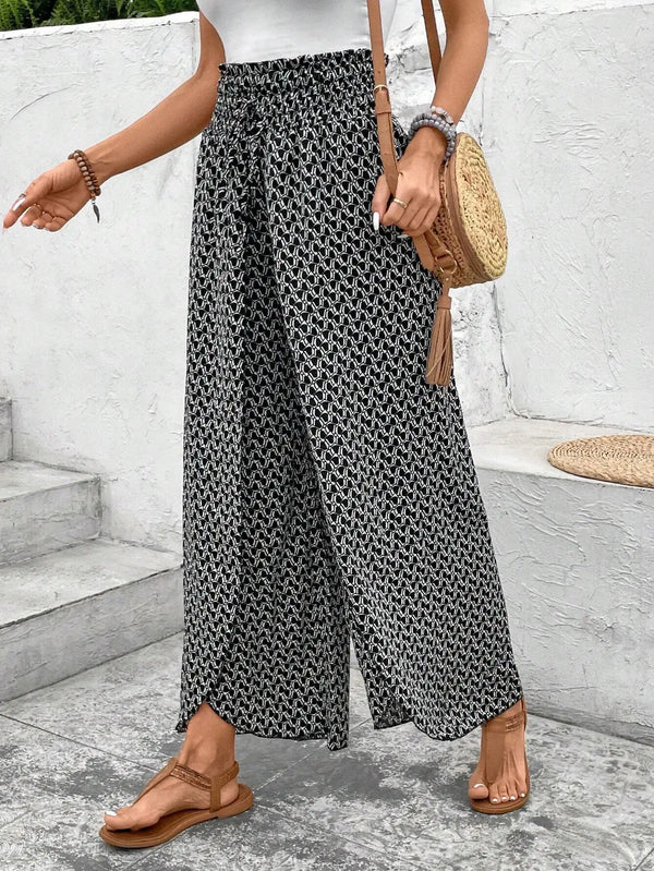 Floral wide-leg chiffon pants for women, ankle-length, elastic waist, perfect for summer fashion and casual chic outfits.