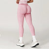 Dark green ankle-length yoga leggings designed for flexibility.