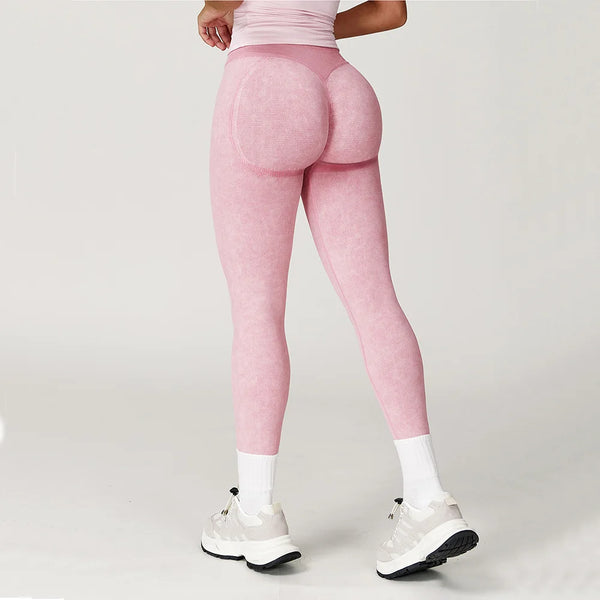 Dark green ankle-length yoga leggings designed for flexibility.
