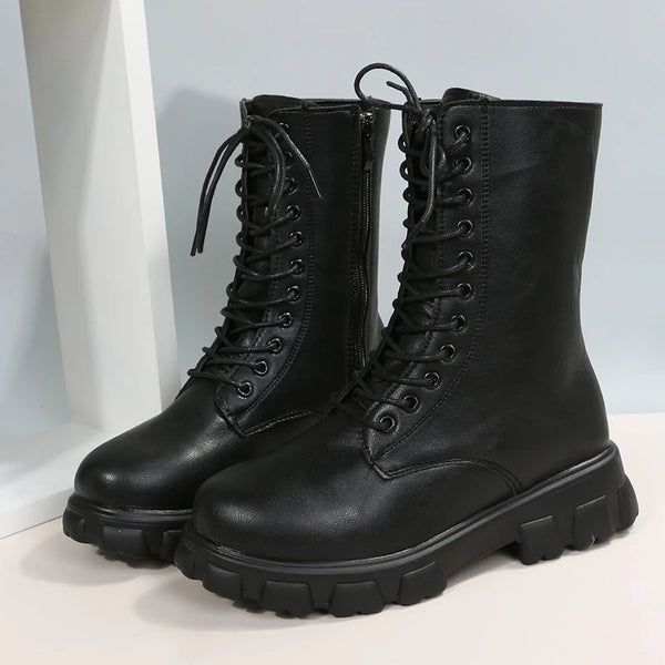 Chic white ankle boots with chunky heel, lace-up closure, and durable PU leather for stylish fall/winter outfits.