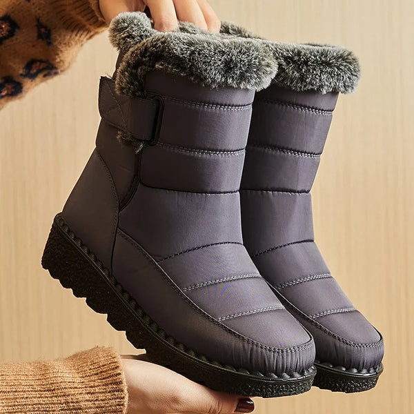 Chic women's waterproof winter boots with plush lining, low heel, and durable design for stylish cold weather footwear.