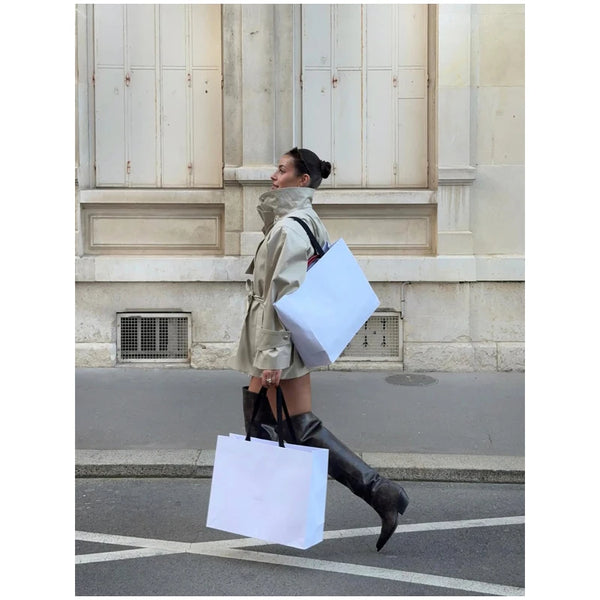 Classic women's khaki trench coat with sophisticated stand collar detail