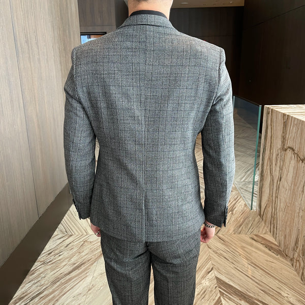 Detail of the suit's tailored fit, emphasizing a flattering silhouette.