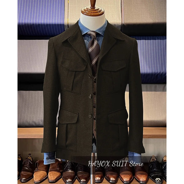 Vintage tweed herringbone men's blazer with four pockets, notched collar, and single-breasted design for stylish occasions.