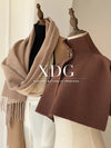 Chic women's scarf in elegant cream, perfect for layering over winter outfits.