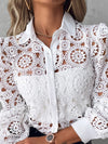 Elegant white lace blouse with long sleeves, button-up front, and turn-down collar for sophisticated office wear.