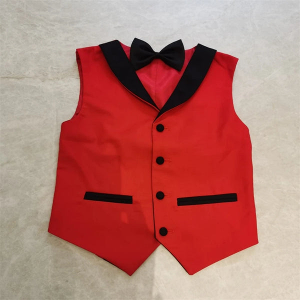 Boy's stylish outfit featuring a crisp white dress shirt under the blazer.
