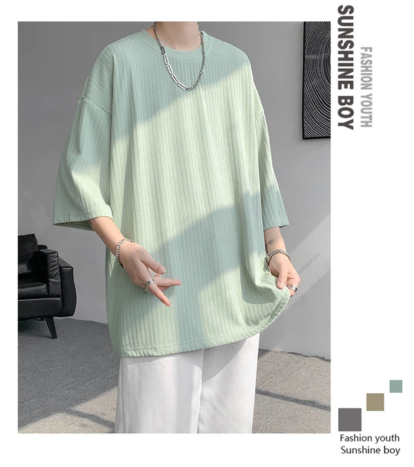 Close-up of the classic stripes on the summer tee, showcasing its stylish design.