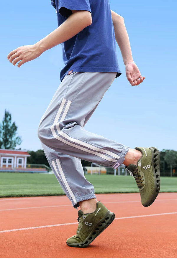 Pair of shock-absorbing hiking shoes displayed from multiple angles